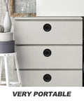 Super Sleek Four Pack Retractable Spring Loaded Cabinet Knobs Concealed Drawer Pulls on modern grey dresser.