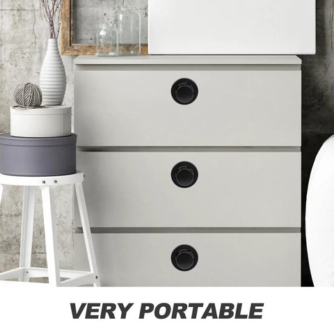 Super Sleek Four Pack Retractable Spring Loaded Cabinet Knobs Concealed Drawer Pulls on modern grey dresser.