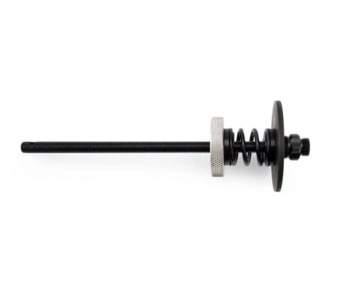 Side view of Bottom Bracket Retaining System With Double Sided Adapter Nut For Cartridge BBs in black with clamping spring.