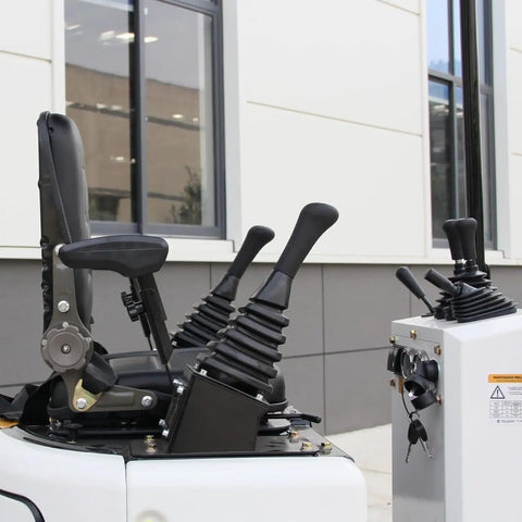 1.2 Ton Pilot Control Gasoline Excavator With Lawn Mower Attachment pilot controls and seat detail for compact frame use