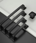 10 Pack Matte Black 3 Inch Hole Centers Cabinet Pulls Solid Zinc Alloy Kitchen Drawer Handles arranged on a surface