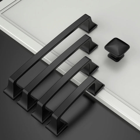 10 Pack Matte Black 3 Inch Hole Centers Cabinet Pulls Solid Zinc Alloy Kitchen Drawer Handles arranged on a surface