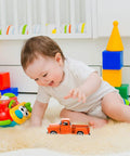 Child playing with Totally Realistic Small Pickup Truck Model Miniature Figurine For Home Decor And Tabletop Display on carpet