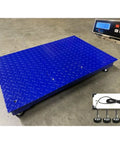 Heavy Duty Digital Industrial Floor Scale Straight Up Built Tough For Warehouse Grind Dead On Accurate Pallet Scale With Crisp Display 24 X 36 Inch Platform And 1000 Lb Capacity with blue textured platform and digital display.