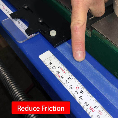UHMW Polyethylene Tape For Surface Protection And Squeak Reduction applied to sliding table with ruler measuring placement.