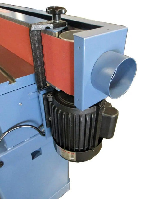Close-up of 6 Inch By 89 Inch Tilting Edge Sander With Heavy Duty Adjustable Cast Iron Table, showing motor and graphite coated platen.