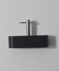 Hella Tough Futon Oblong Roller Replacement Glide With Steel Pin Shaft Hardware For Heavy Duty Sofa Floor Protectors showing black roller.