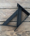 Rock Solid Floating Shelf Brackets Heavy Duty Tripod Wall Supports shown from side, black iron material, designed for sturdy shelf installation.