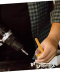 Person using Rock Solid Four Piece T Handle Drill Chuck Key Set with ergonomic handle on a drill.