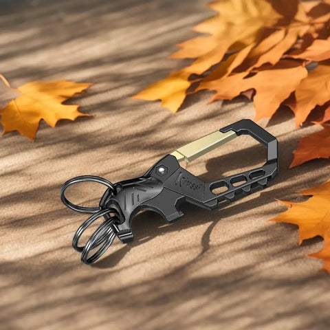 Heavy Duty Metal Keychain Set With Carabiner Clip, Bottle Opener And Three Key Rings on wooden surface with autumn leaves