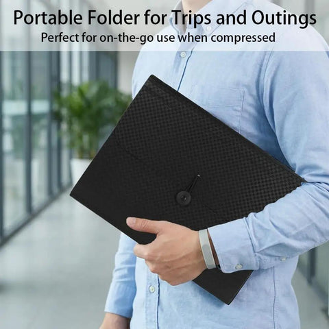 Man holding Expanding File Folder 13 Pocket Accordion Organizer For A4 And Letter Size With Elastic Buckle Closure Labels Ultra Light.