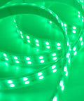 Close-up of Five 5M RGB LED Strips Kit With IP67 Waterproof Silicone Sleeve, emitting green light, SMD5050 Double Row 120 LEDs Per Meter.
