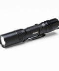 Tac 1AA LED Tactical Flashlight with clip, water resistant, black aluminum design, pocket size, includes batteries, side view