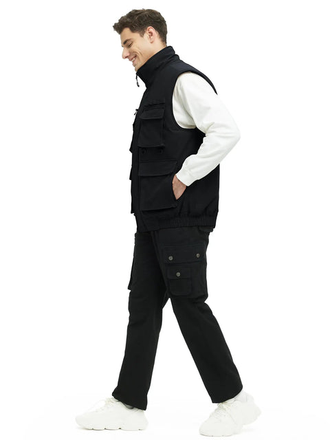 Mens Fleece Lined Winter Vest Windproof Water Resistant Outerwear shown on model walking, featuring multiple secure pockets.