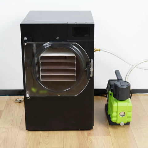 Heavy Duty Oil Mist Filter For Vacuum Pump and Freeze Dryer Exhaust with M30X1.5 port installed beside a freeze dryer.
