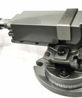 Heavy Duty Swivel Milling Vise With Smooth Angle Tilt Setup And Beefy Two Inch Jaw Precision Clamp on a workbench.