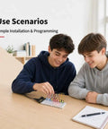 Two people using All In One Electronics Kit With UNO R3 Compatible Board Power Supply Module 480 Pcs at a desk.