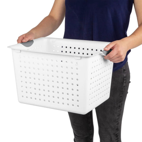 Person holding one Deep Ultra Open Top Plastic Storage Baskets Six Pack White For Counters, Pantry Shelves, Kitchen Cabinets, Laundry Rooms.