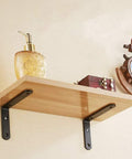 Ultra Strong Black L Brackets Wall Mounts Rock Solid Corner Shelf Supports Rust Proof Iron Braces Quick Setup Kit For Diy Floating Shelves And Home Storage Goals holding wood shelf with decorative items.