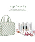 Must Have Hanging Toiletry Bag For Women Travel Organizer With Checkered Green Design next to cosmetics and brushes