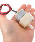 Low Noise Water Spray Motor For Fog Bubble Machine Replacement Part With Metal And Plastic Build Party Ready Quiet Drive For Indoor Parties Stage Effects And Reliable Fogger Power, compact motor in hand