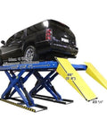Px16a Scissor Alignment Lift And RJ8 Rolling Jacks Combo Beefy Auto Garage Gear lifting a black vehicle with ramps.