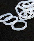 Assorted White Food Grade Silicone O Ring Set Top Notch 2mm 2.4mm 3mm 4mm Thick O Ring Seals For Plumbing Industrial Equipment Food Processing Automotive And More Ten Pack white silicone O rings on black background