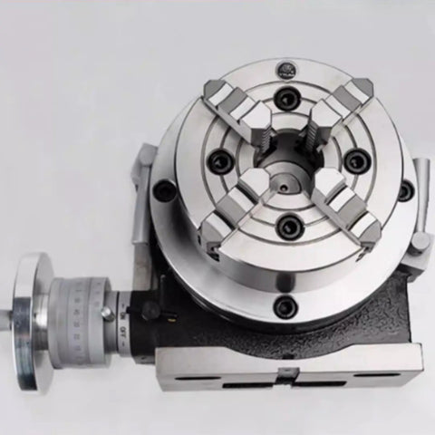 Built Tough Universal Indexing Head For Rotary Table With Four Jaw Chuck And 90 To 1 Worm Gear Vertical Horizontal Milling Rig 12 Inch Precision Shop Essentials top view of precision indexing head with stainless steel jaws.