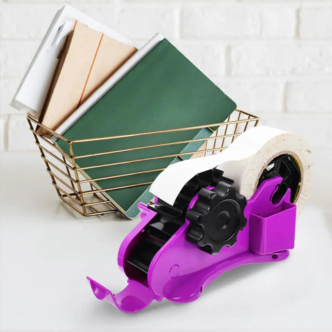 Heavy Duty Semi Automatic Packing Tape Dispenser Smooth Operator Design With Nifty Dual Cutting Station beside a wire basket with notebooks.