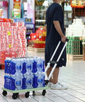 Adjustable Aluminum Folding Dolly With Six Wheels Heavy Duty Portable Hand Truck For Moving Boxes Groceries Luggage And More Includes Elastic Straps For Easy Transport And Rock Solid Stability, green folded dolly carrying bottled water