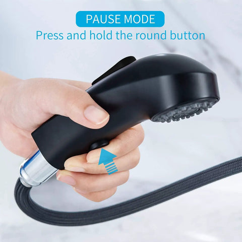 Close-up of hand holding Matte Black Vessel Sink Faucet With Pull Out Hose Tall High Arc Single Hole Design 3-Mode Pull-Down Sprayer