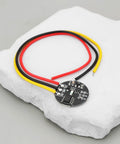 Two Pack DC 3 To 24V 10A Capacitive Touch Switch Module For Touch Switches And LED Lighting Modifications on stone surface