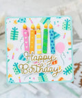 Birthday card with colorful candle design and 'Happy Birthday' text using Happy Birthday Balloons Metal Die-Cuts For Scrapbookers.