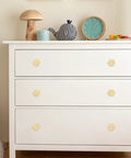 4 Pack Gold Paw Print Cabinet Knobs and Drawer Pulls Super Cute Claw Shape Zinc Alloy Handles with Screws on white dresser.