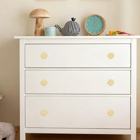 4 Pack Gold Paw Print Cabinet Knobs and Drawer Pulls Super Cute Claw Shape Zinc Alloy Handles with Screws on white dresser.