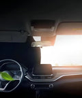 Heavy Duty Windshield Sunshade For Tesla Model 3 Y S X Cybertruck blocking sunlight inside a Tesla cabin.