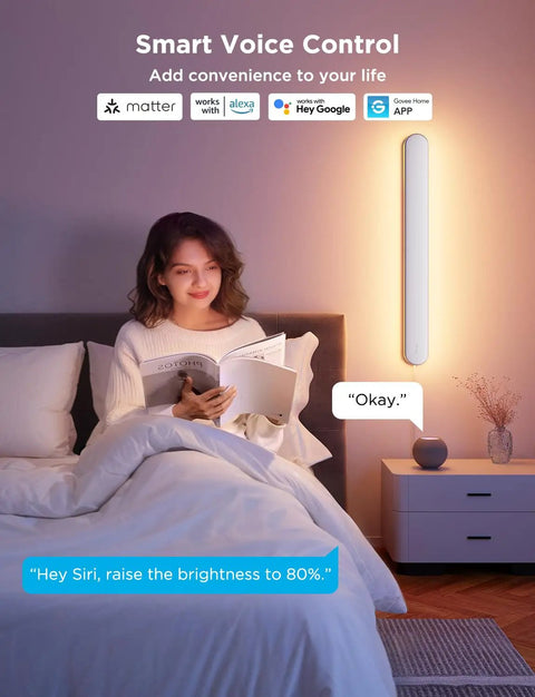 Person reading in bed with Smart Wall Sconce featuring RGBICW LED Bulbs, adjustable brightness, cozy atmosphere.