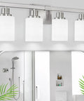 4-Light Nickel Modern Bathroom Vanity Light Fixture With Milky White Glass Shades above bathroom mirror