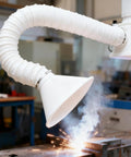 Adjustable 4.9FT Real Deal Smoke Extractor Arm With Heavy Duty Dust Hose For Soldering Fume Capture and 50 MM Diameter Valve in use near welding sparks.