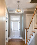 3 Light Farmhouse Pendant Light Semi Flush Mount With Brushed Nickel And Clear Glass Shade, hanging in a bright entryway