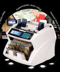 Top Shelf High Speed Cash Counter For Handling Bulk Greenback Rolls With Ultraviolet Magnetic Infrared Counterfeit Detection Multi Currency Tally Validator And Sorter with bills being fed in.
