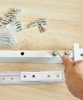 Heavy Duty Hidden Headboard Wall Mount Brackets For Sofa And Couch Sections With Solid Silver Metal Connectors shown during assembly