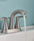 Graeden Two Handle Four Inch Centerset Bathroom Faucet in Spot Resist Brushed Nickel with running water in modern bathroom