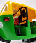 Ace Handcrafted Miniature Auto Rickshaw Desk Model Sporting vivid yellow and green finish showcasing detailed interior with driver figurine.
