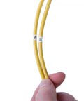 Pocket Wire Marker Booklet 42-029 with labels "A" and "B" on yellow wires for electrical projects.