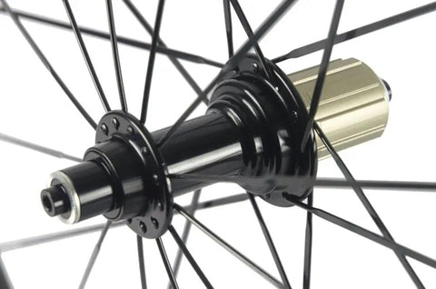 Close-up of hub and spokes for Road Ready Turbo Carbon Wheelset 38 50 60 88mm For 700c Clincher 23mm Wide UD Matte Finish Aero Rim Set Built For Speed V Brake Compatible Shimano 8 9 10 11 Speed Cassette Body