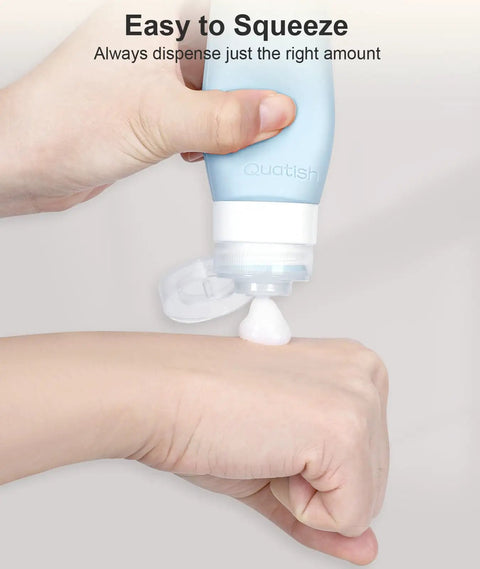 Squeezing cream from a silicone bottle from Must Have 20 Pack Travel Toiletry Bottles Set With Leakproof Silicone Containers.