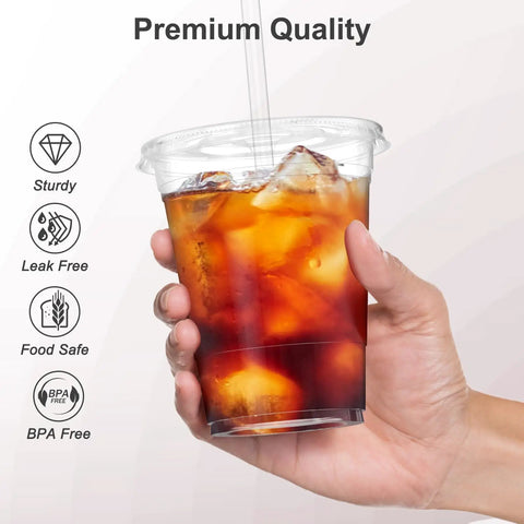Hand holding iced drink in 100 Pack 16 Oz Clear Plastic Cups With Lids And Straws, Sturdy Food Safe Disposable Cups For Iced Coffee, Smoothies.