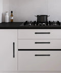Modern kitchen with 10 Pack 5 Inch Matte Black Cabinet Handles For Kitchen Cabinets And Drawers Alloy Drawer Pulls Solid Cabinet Hardware installed