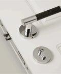 Brass Black Lychee Skin Door Lock Set with modern indoor dummy handle on white door, viewed from above